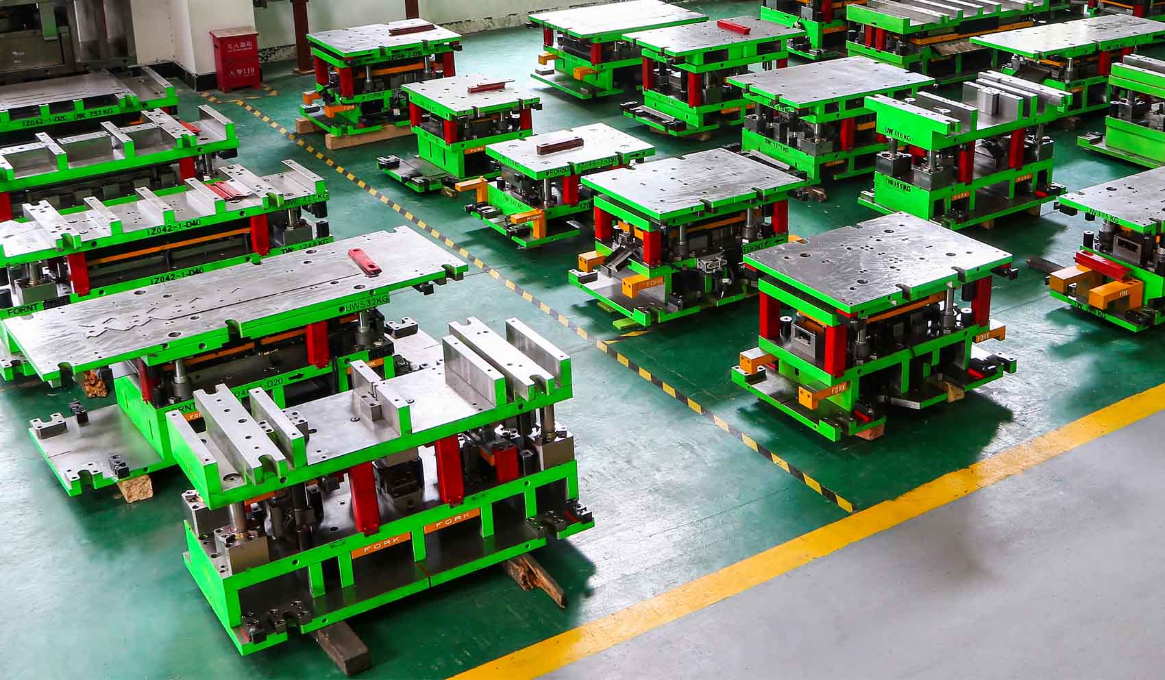 Automotive stamping die manufacturing workshop with CNC machining equipment